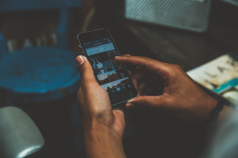 Man browsing mobile phone