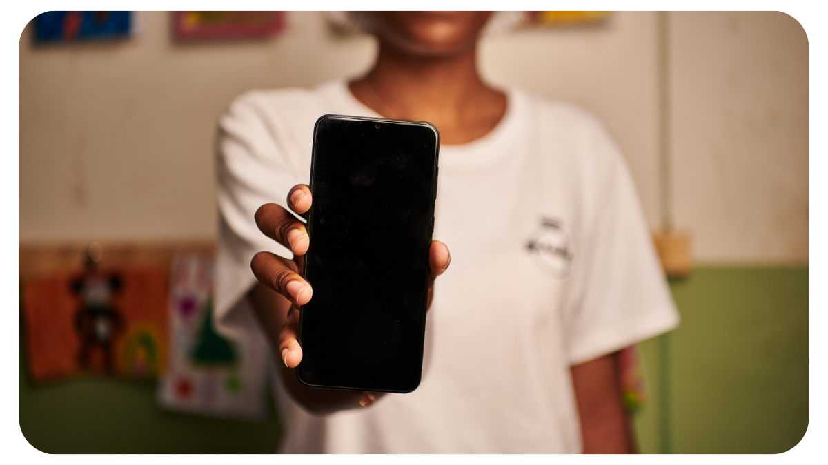 Photo of woman holding smartphone in foreground